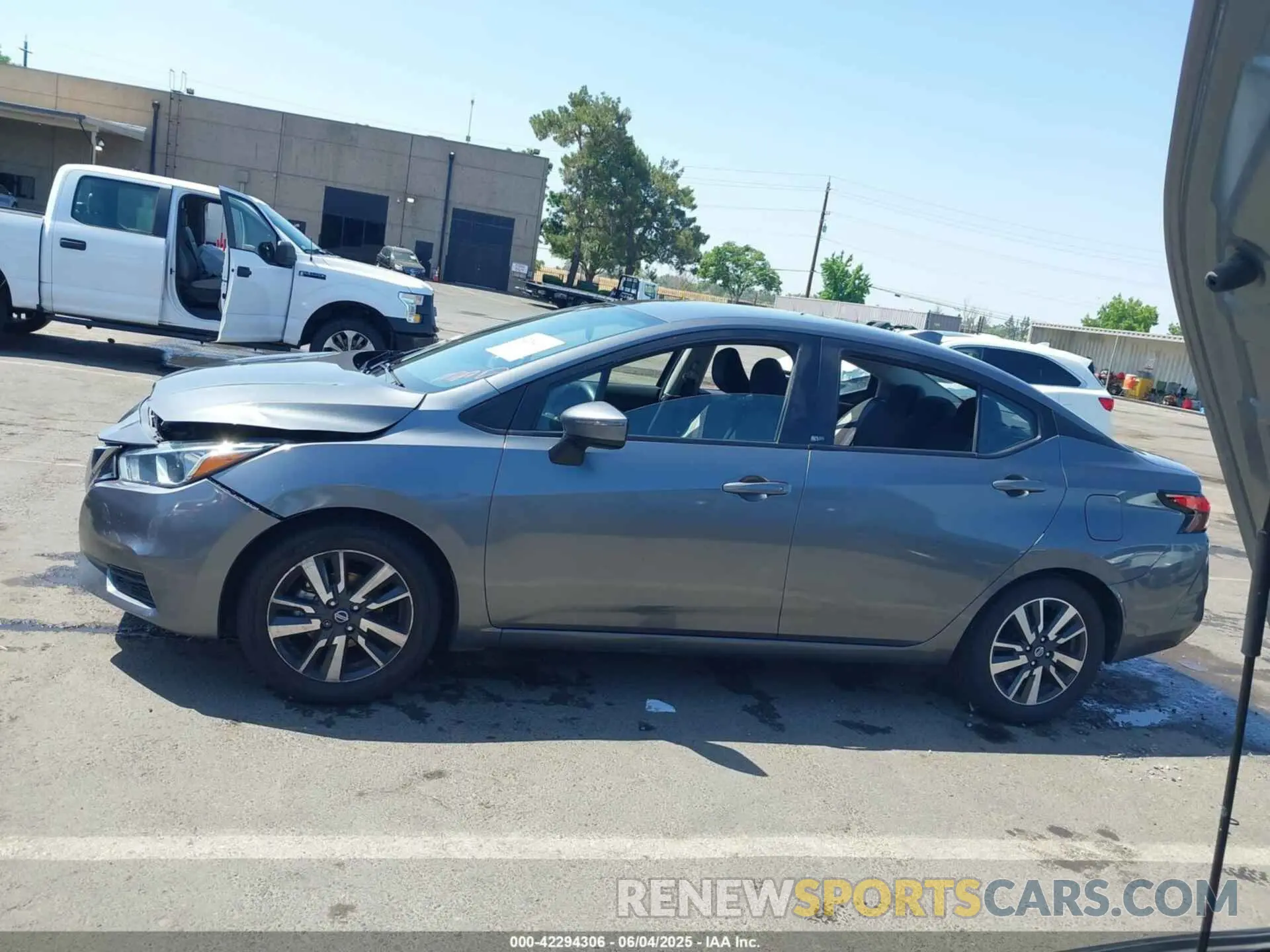 14 Photograph of a damaged car 3N1CN8EVXML884638 NISSAN VERSA 2021