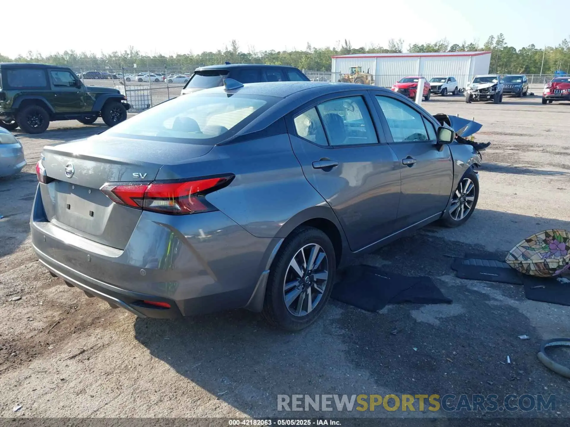 4 Photograph of a damaged car 3N1CN8EV0NL863749 NISSAN VERSA 2022