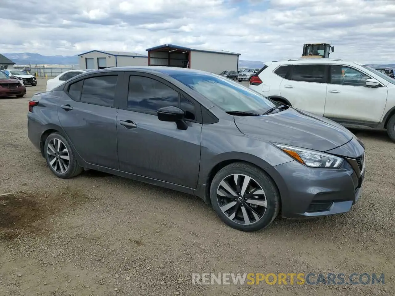 4 Photograph of a damaged car 3N1CN8FVXNL832202 NISSAN VERSA 2022