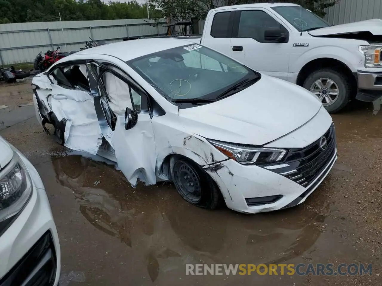 4 Photograph of a damaged car 3N1CN8DV1PL829498 NISSAN VERSA 2023
