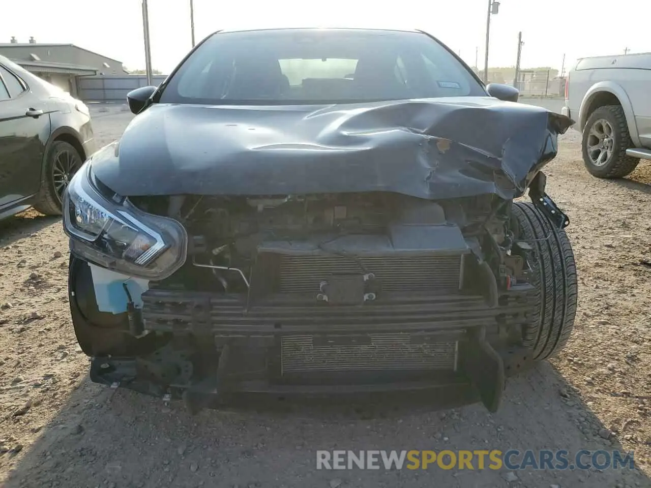 5 Photograph of a damaged car 3N1CN8DV5PL832582 NISSAN VERSA 2023