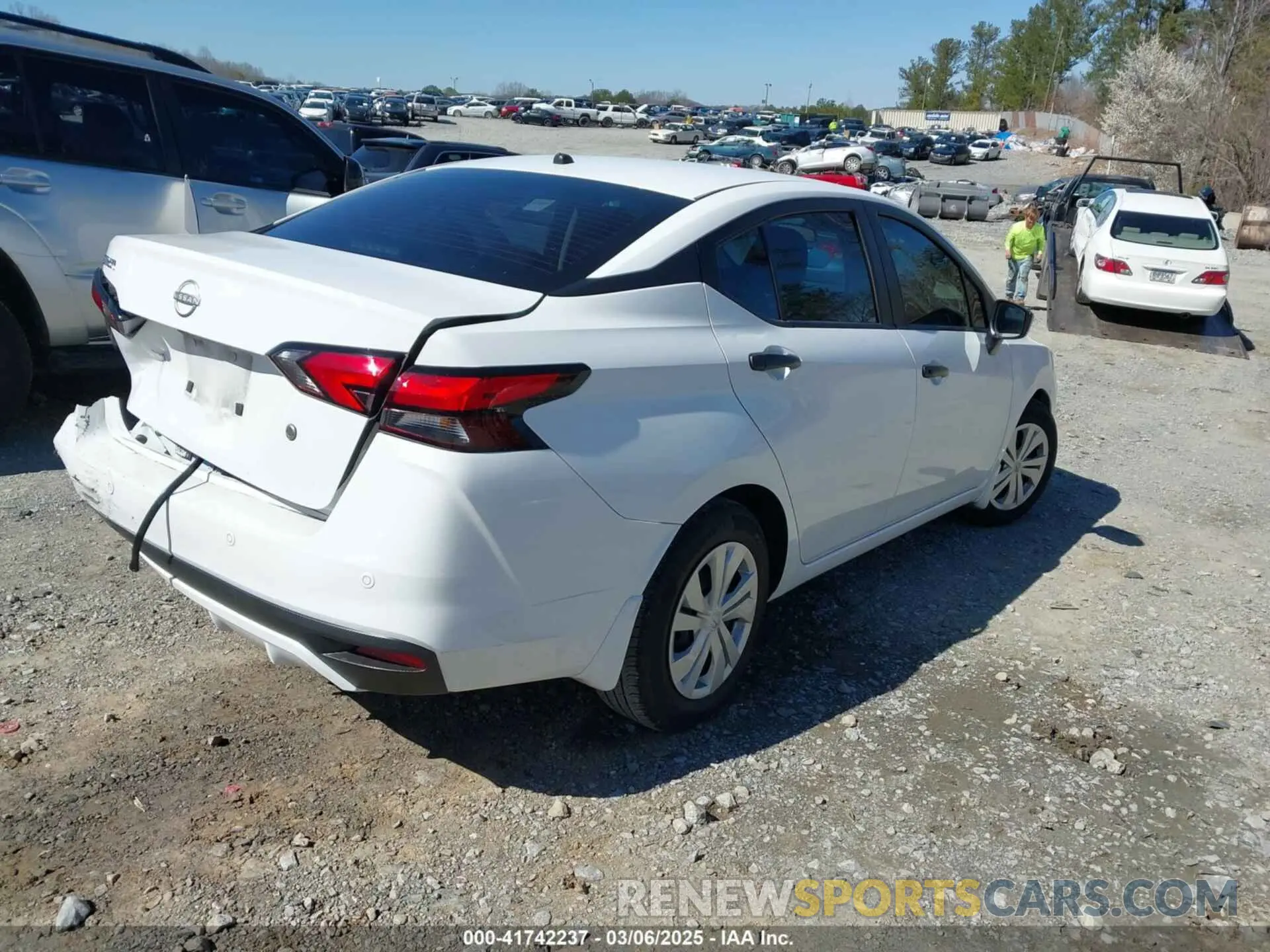 4 Photograph of a damaged car 3N1CN8DV5PL868739 NISSAN VERSA 2023