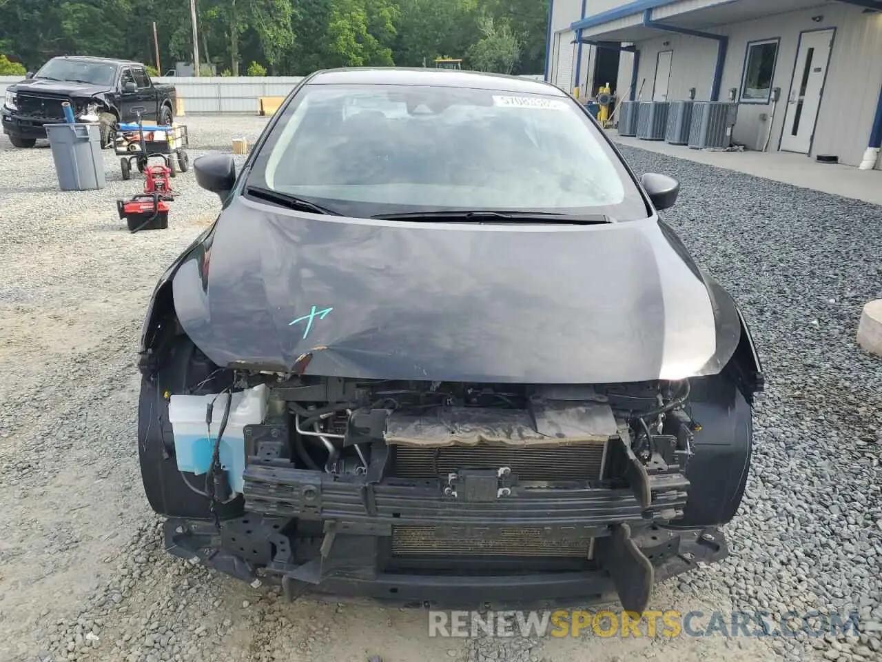 5 Photograph of a damaged car 3N1CN8DV7PL817968 NISSAN VERSA 2023