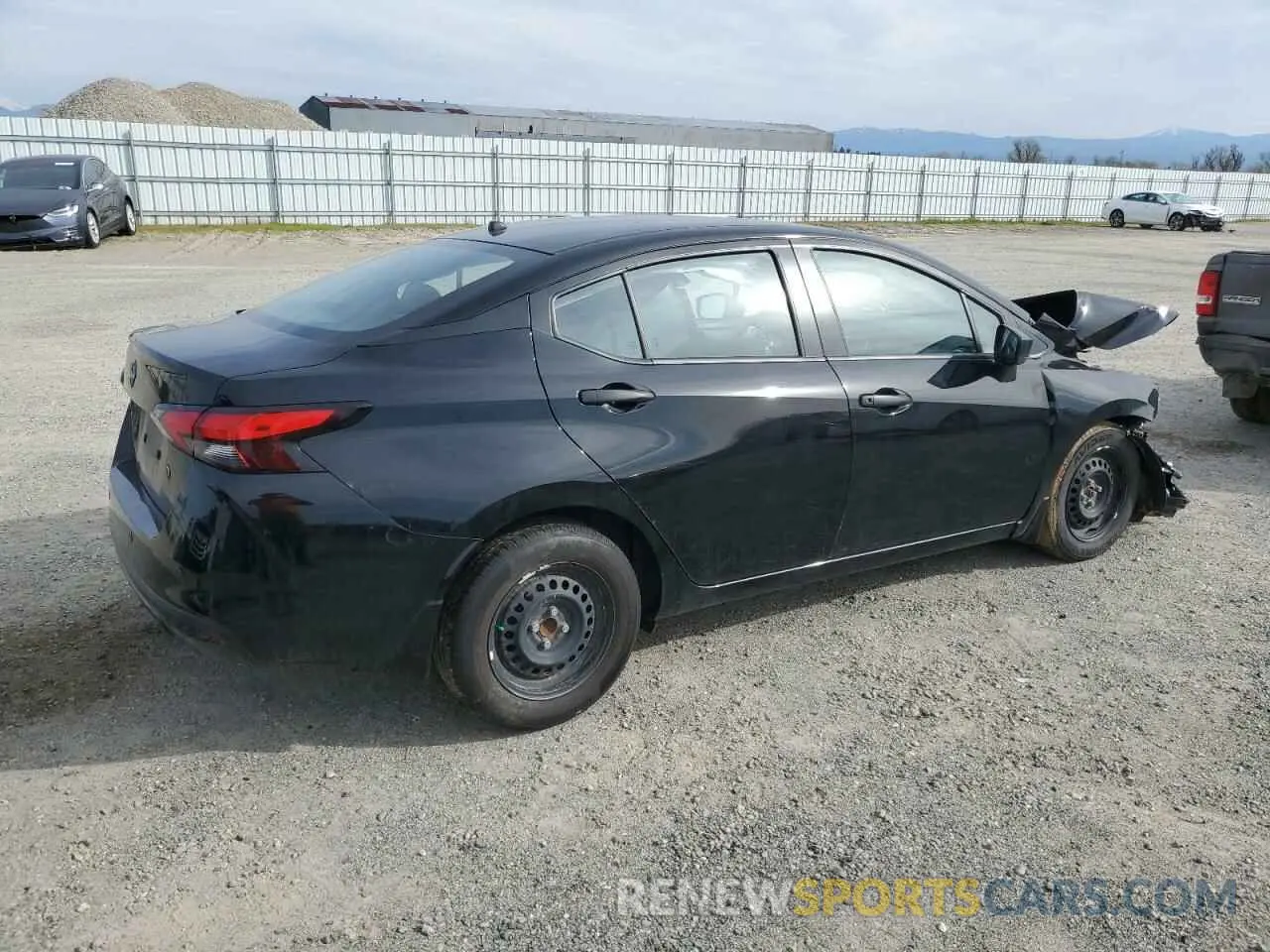 3 Photograph of a damaged car 3N1CN8DV7PL851425 NISSAN VERSA 2023