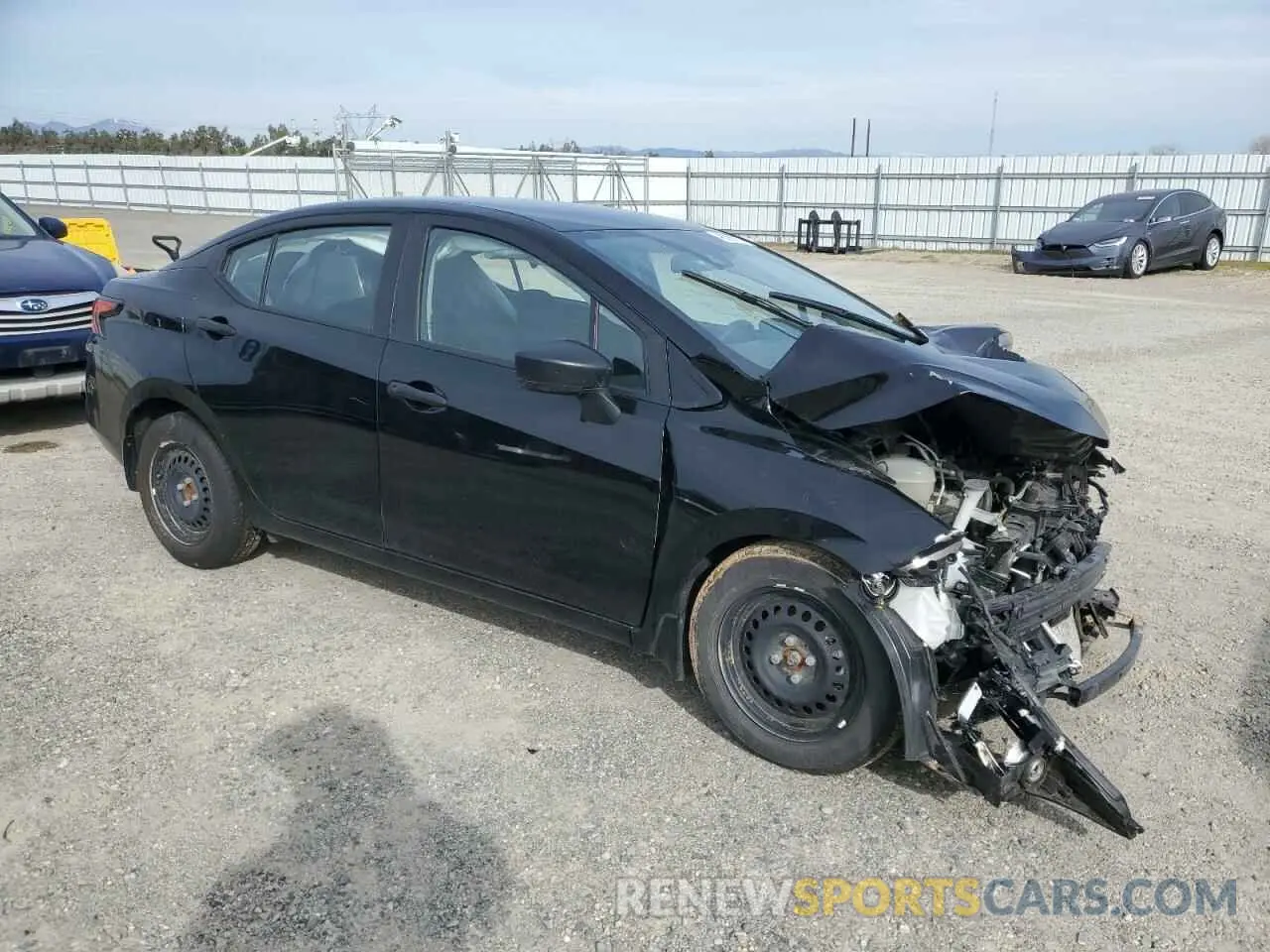 4 Photograph of a damaged car 3N1CN8DV7PL851425 NISSAN VERSA 2023