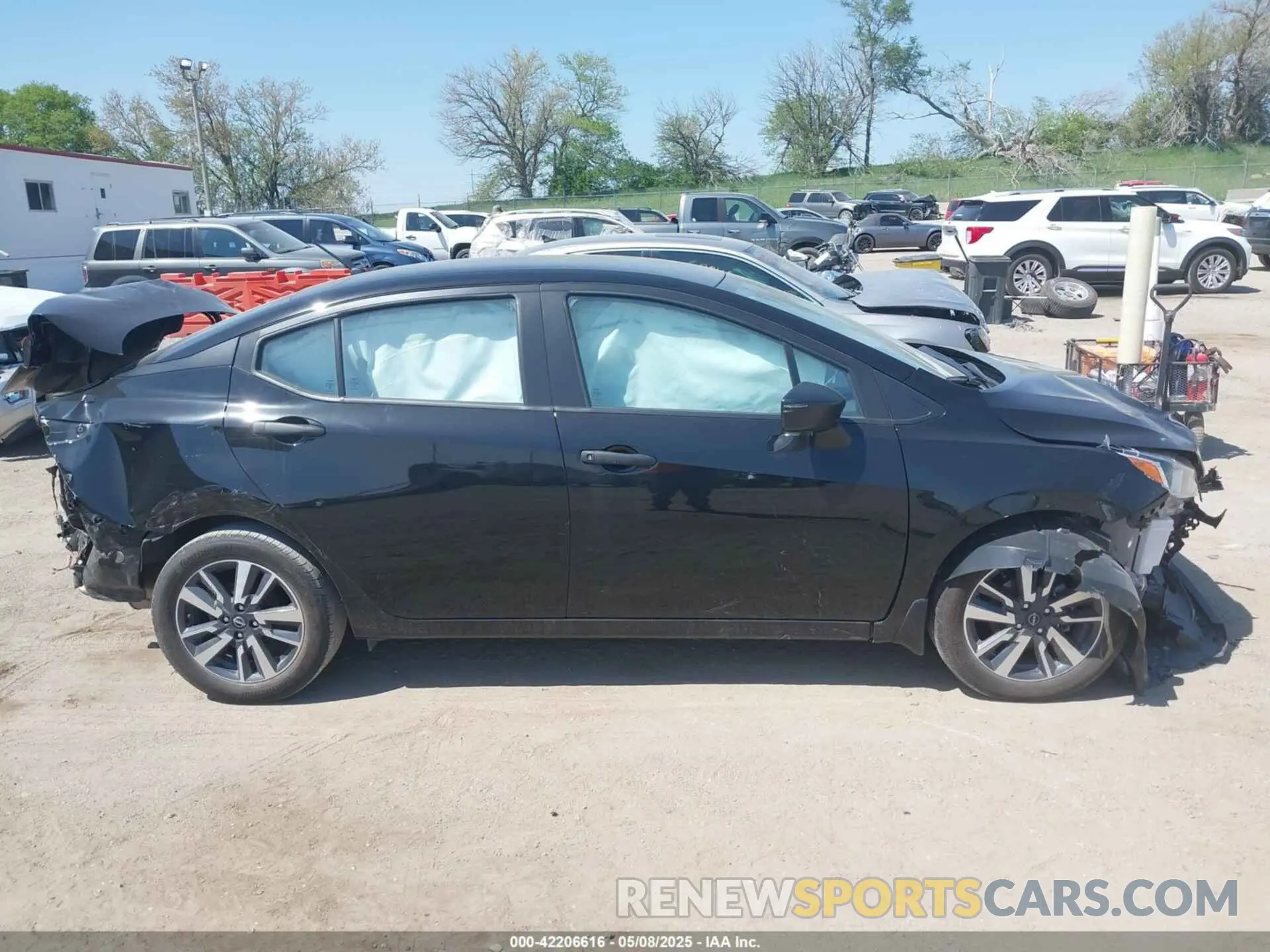 14 Photograph of a damaged car 3N1CN8DV9PL816160 NISSAN VERSA 2023