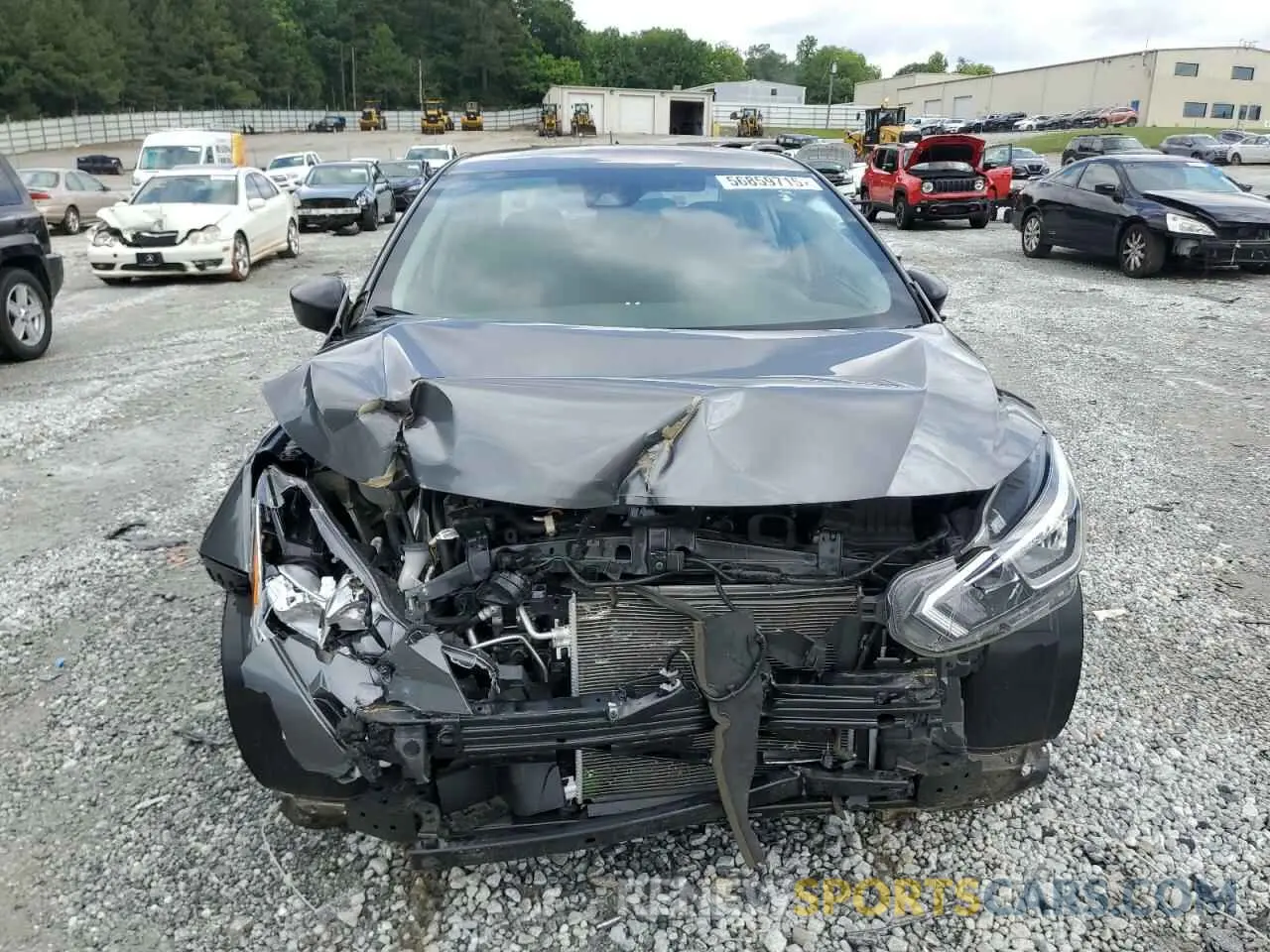5 Photograph of a damaged car 3N1CN8DV9PL837431 NISSAN VERSA 2023