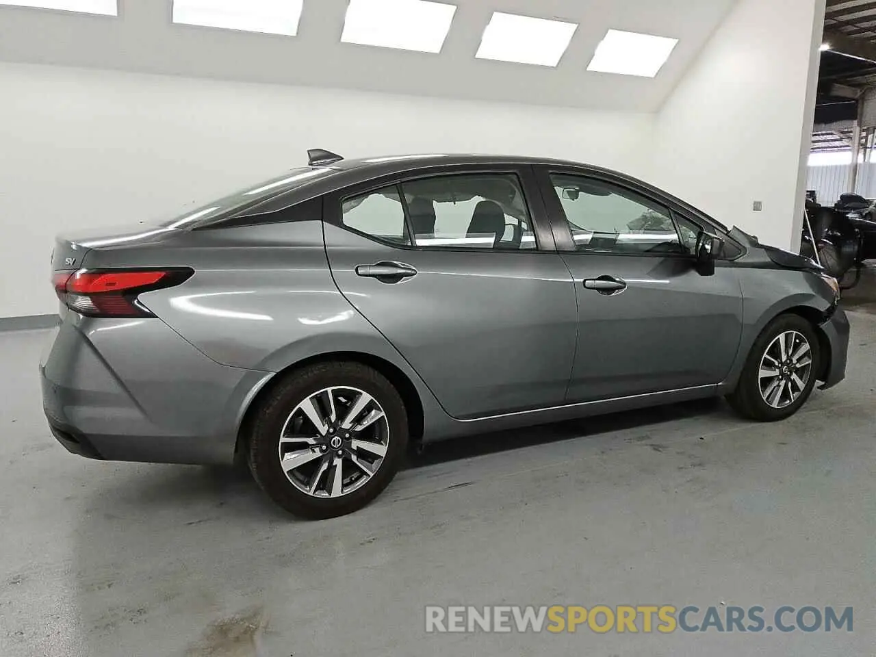 3 Photograph of a damaged car 3N1CN8EV2PL833090 NISSAN VERSA 2023
