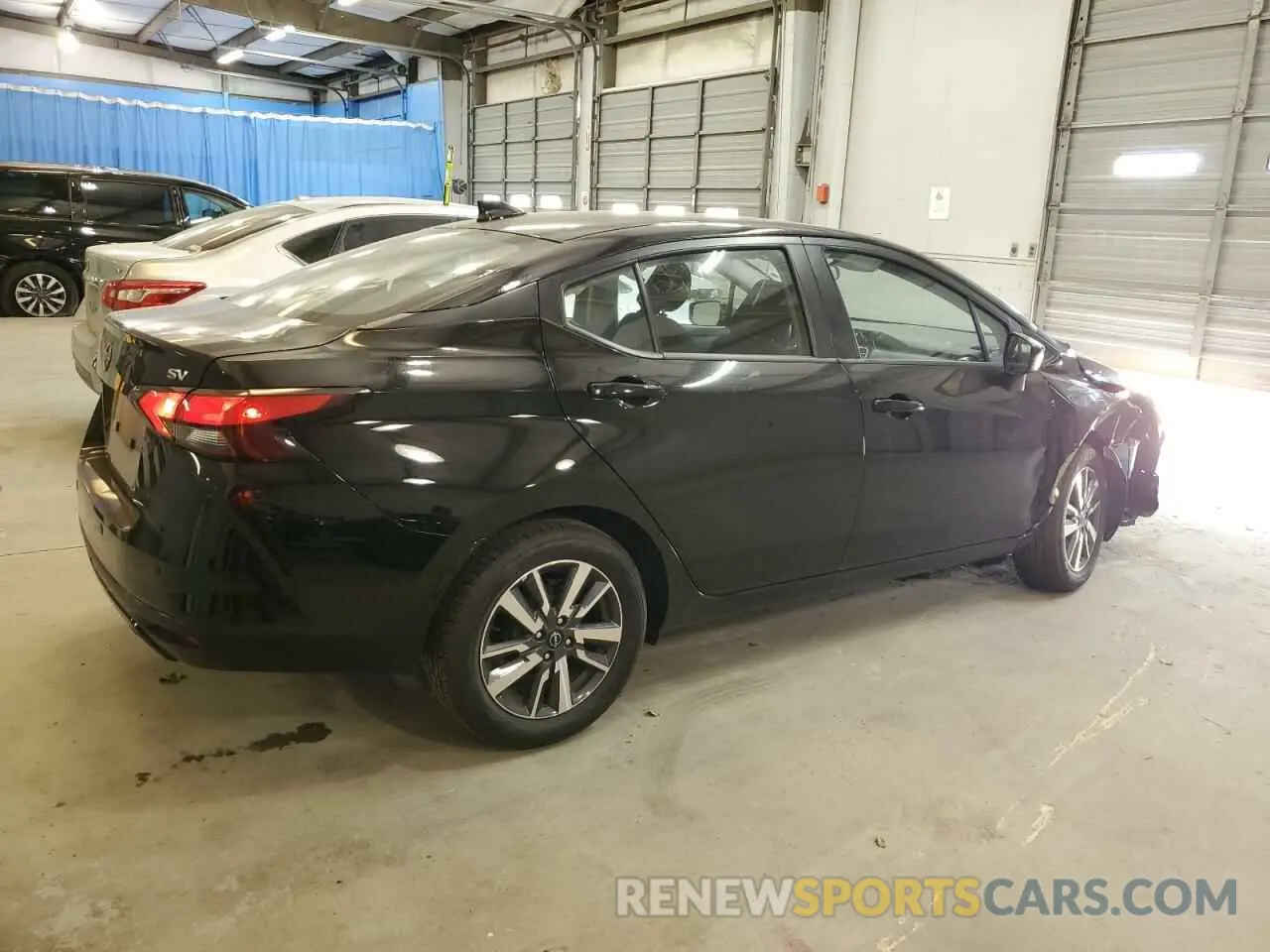 3 Photograph of a damaged car 3N1CN8EV3PL861836 NISSAN VERSA 2023