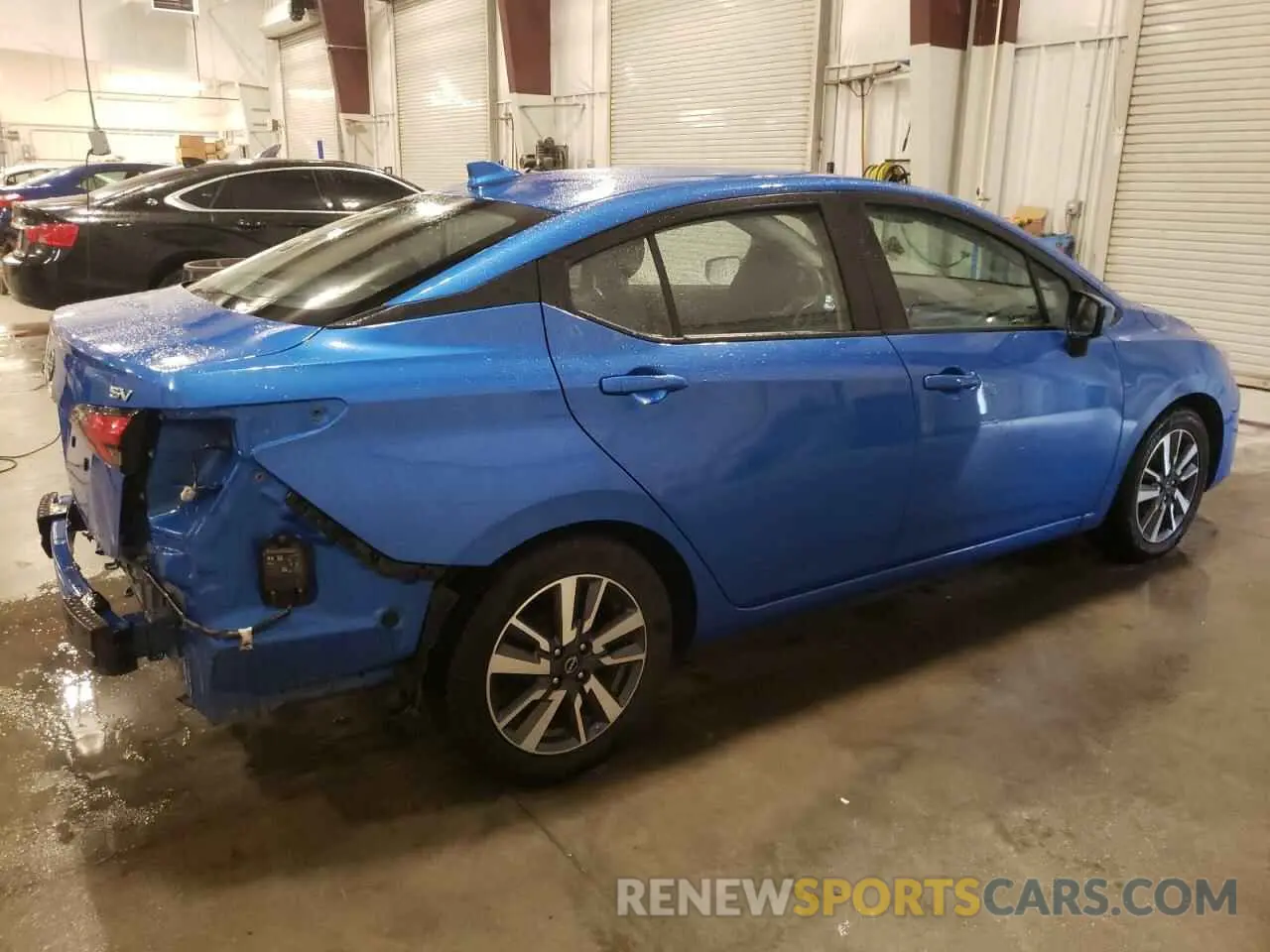 3 Photograph of a damaged car 3N1CN8EV4PL860789 NISSAN VERSA 2023