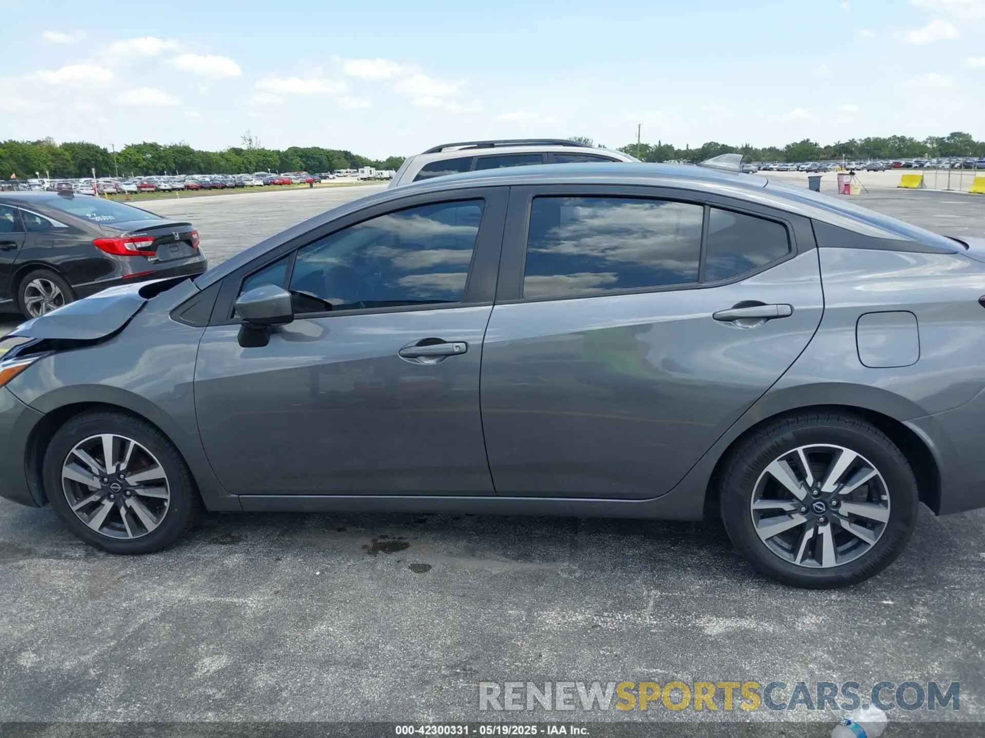 14 Photograph of a damaged car 3N1CN8EV5PL864527 NISSAN VERSA 2023