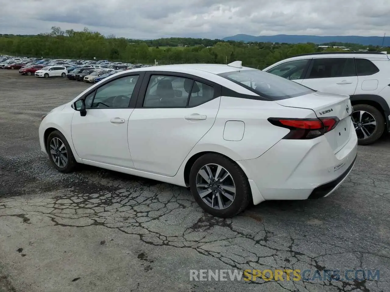 2 Photograph of a damaged car 3N1CN8EV6PL838308 NISSAN VERSA 2023