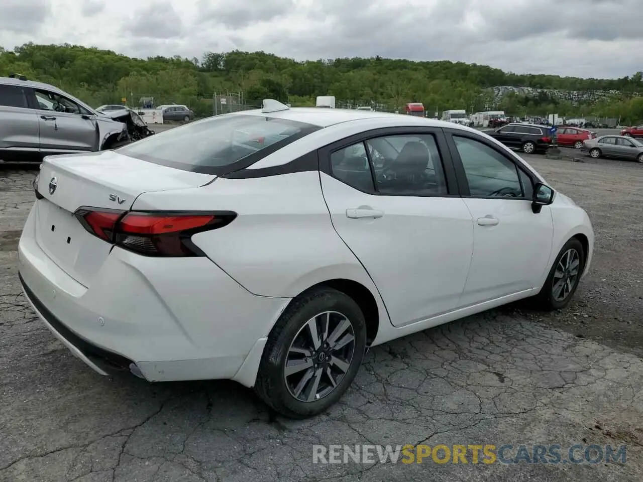 3 Photograph of a damaged car 3N1CN8EV6PL838308 NISSAN VERSA 2023