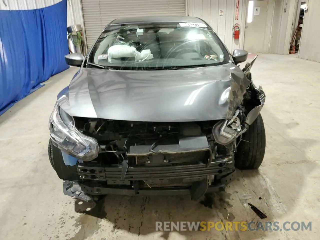 5 Photograph of a damaged car 3N1CN8EV6PL859904 NISSAN VERSA 2023