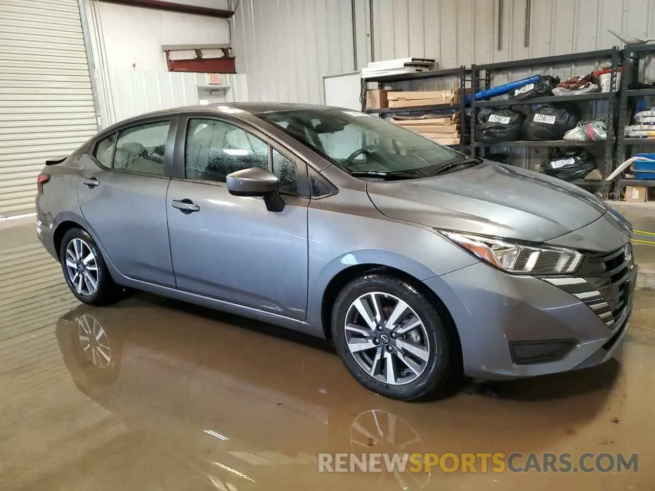 4 Photograph of a damaged car 3N1CN8EV8PL862187 NISSAN VERSA 2023