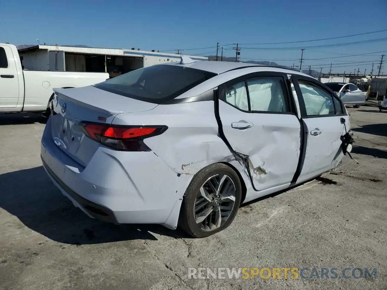 3 Photograph of a damaged car 3N1CN8FV6PL860615 NISSAN VERSA 2023