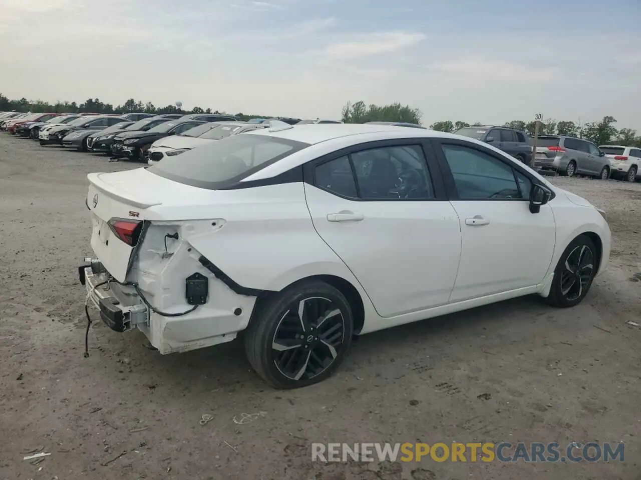 3 Photograph of a damaged car 3N1CN8FV7PL830359 NISSAN VERSA 2023