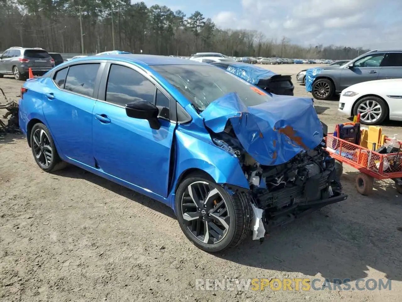 4 Photograph of a damaged car 3N1CN8FV8PL848305 NISSAN VERSA 2023