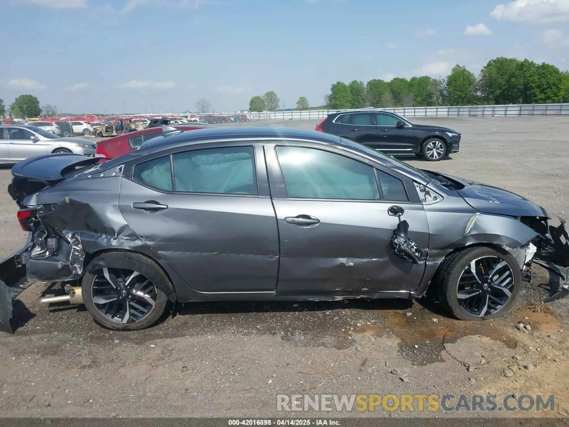 13 Photograph of a damaged car 3N1CN8FV9PL860303 NISSAN VERSA 2023