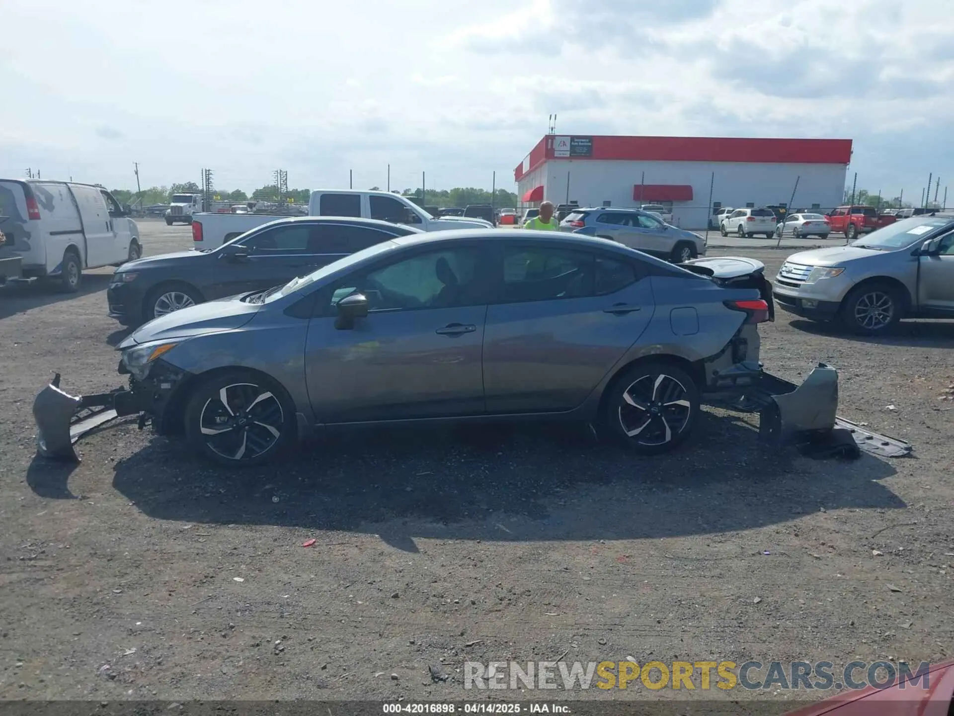 14 Photograph of a damaged car 3N1CN8FV9PL860303 NISSAN VERSA 2023