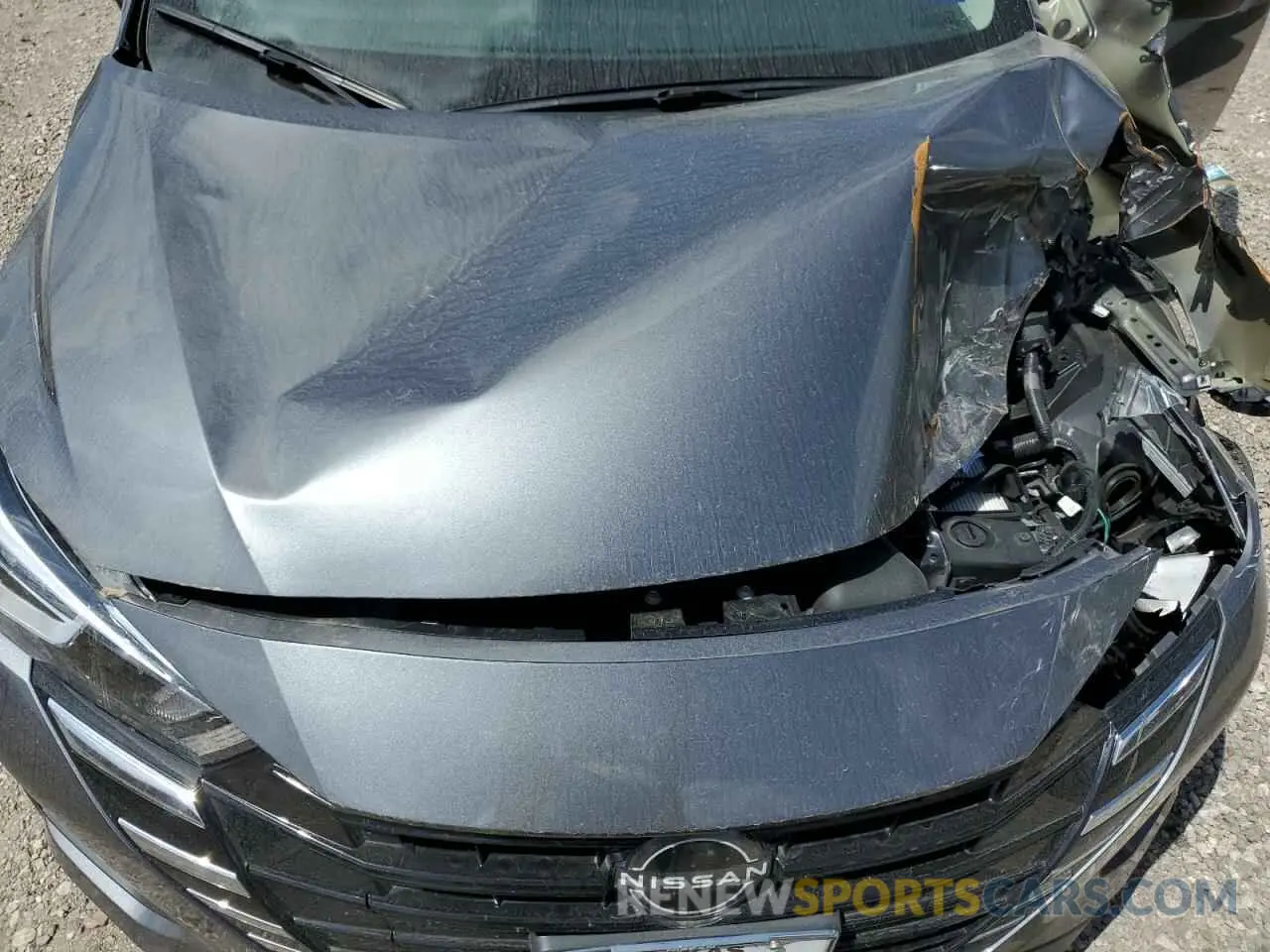 11 Photograph of a damaged car 3N1CN8DV1RL838074 NISSAN VERSA 2024