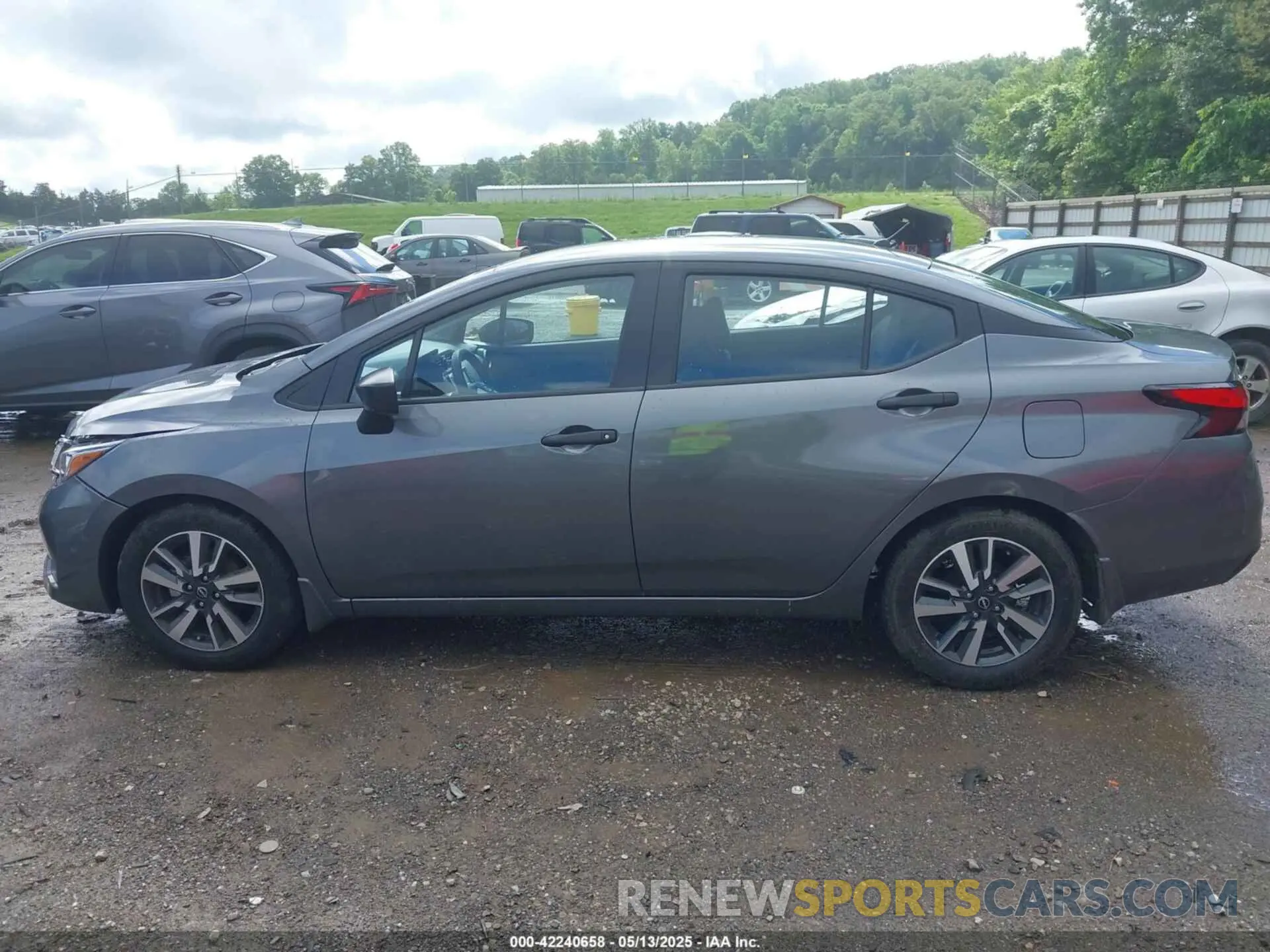 14 Photograph of a damaged car 3N1CN8DV2RL903207 NISSAN VERSA 2024