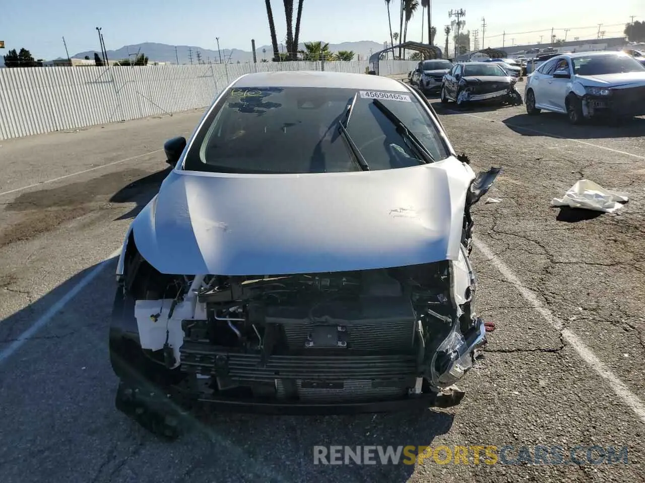5 Photograph of a damaged car 3N1CN8DV3RL835774 NISSAN VERSA 2024