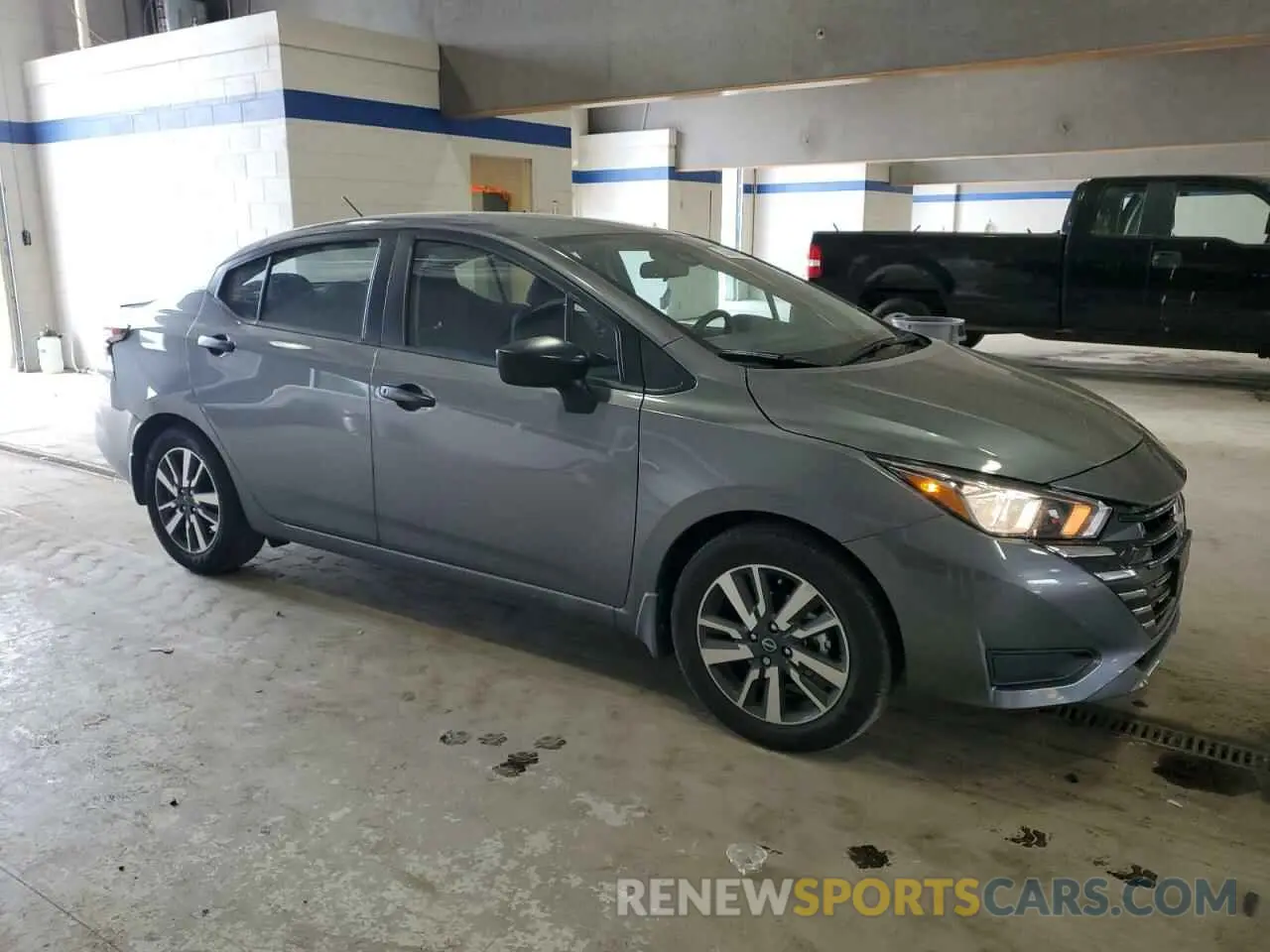 4 Photograph of a damaged car 3N1CN8DV3RL926527 NISSAN VERSA 2024