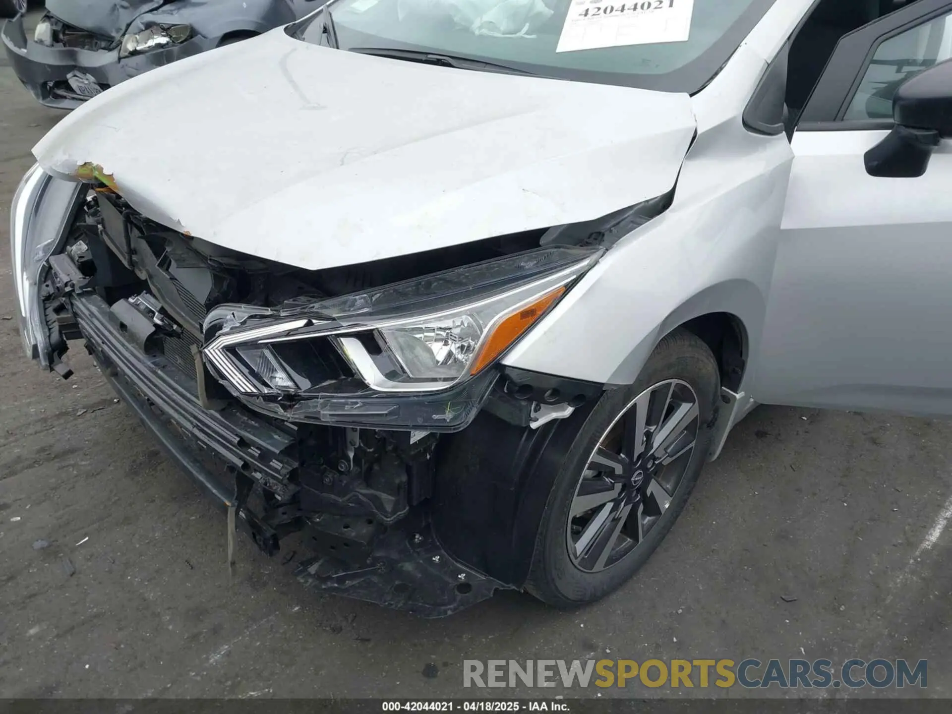 18 Photograph of a damaged car 3N1CN8DV4RL865799 NISSAN VERSA 2024