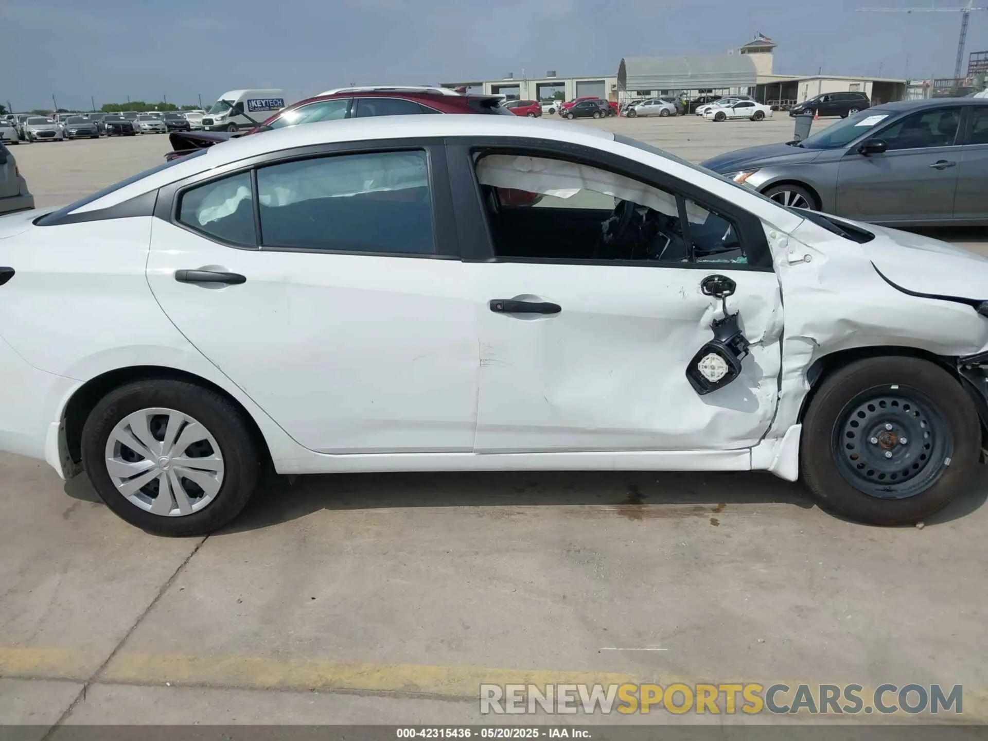 14 Photograph of a damaged car 3N1CN8DV4RL914225 NISSAN VERSA 2024