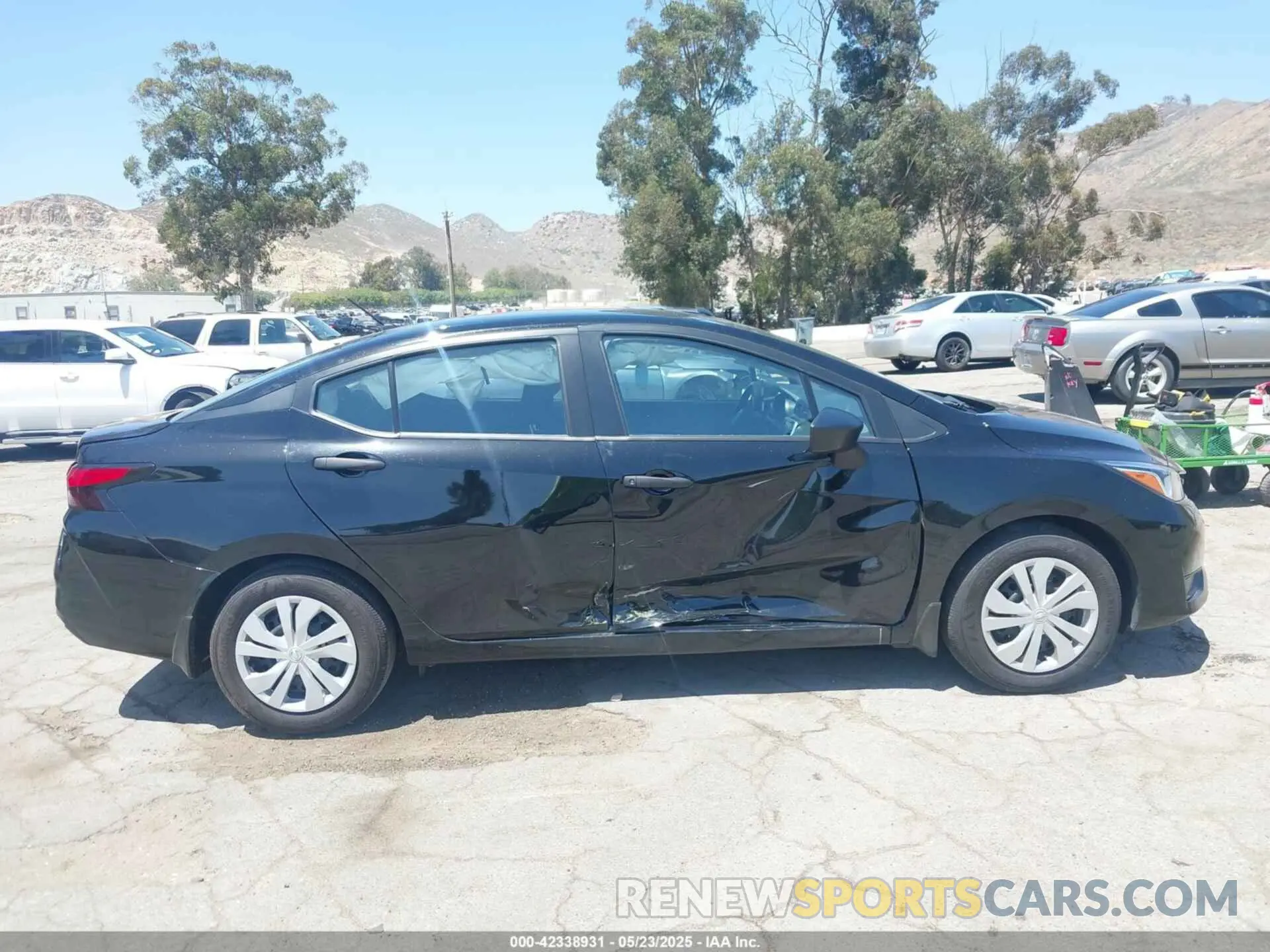 14 Photograph of a damaged car 3N1CN8DV7RL906667 NISSAN VERSA 2024