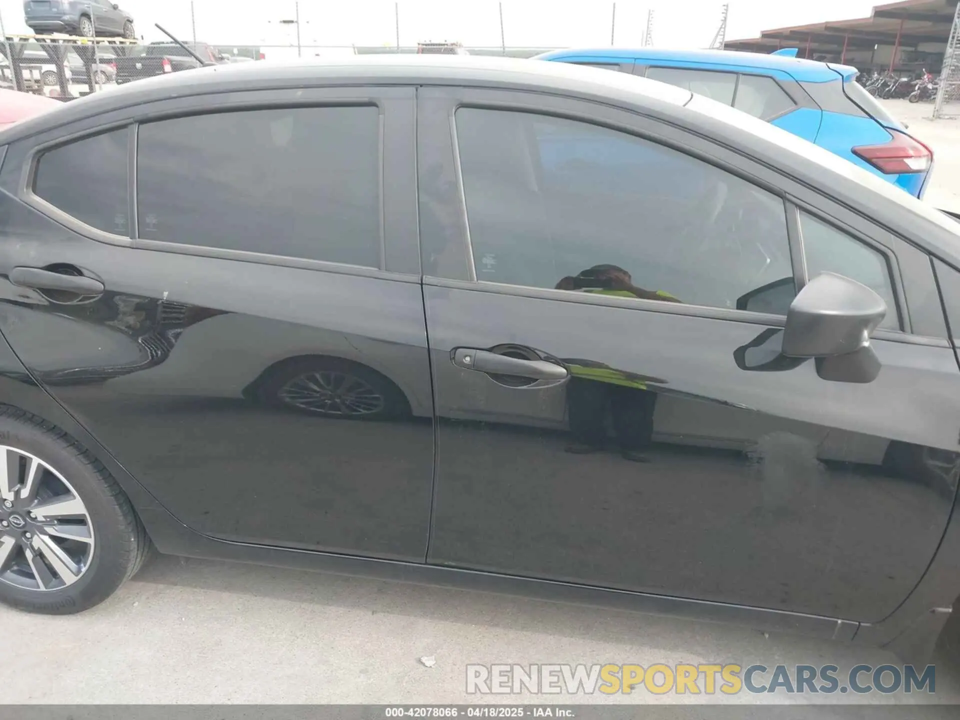 14 Photograph of a damaged car 3N1CN8DV9RL837447 NISSAN VERSA 2024