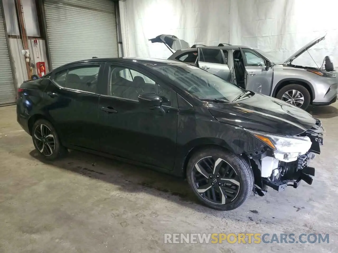 4 Photograph of a damaged car 3N1CN8FV4RL904453 NISSAN VERSA 2024
