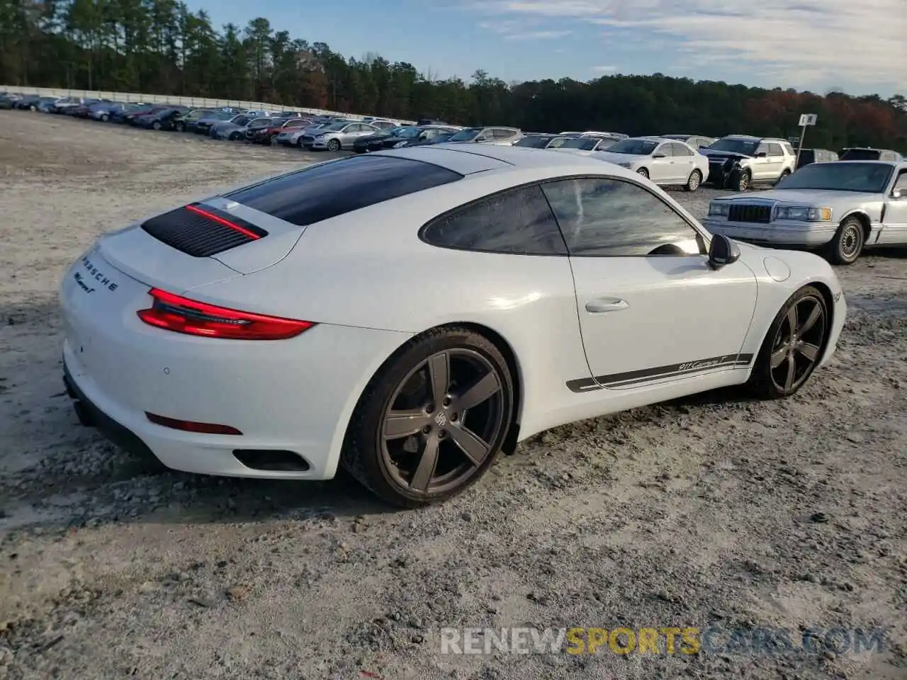 3 Photograph of a damaged car WP0AA2A94KS103214 PORSCHE 911 2019