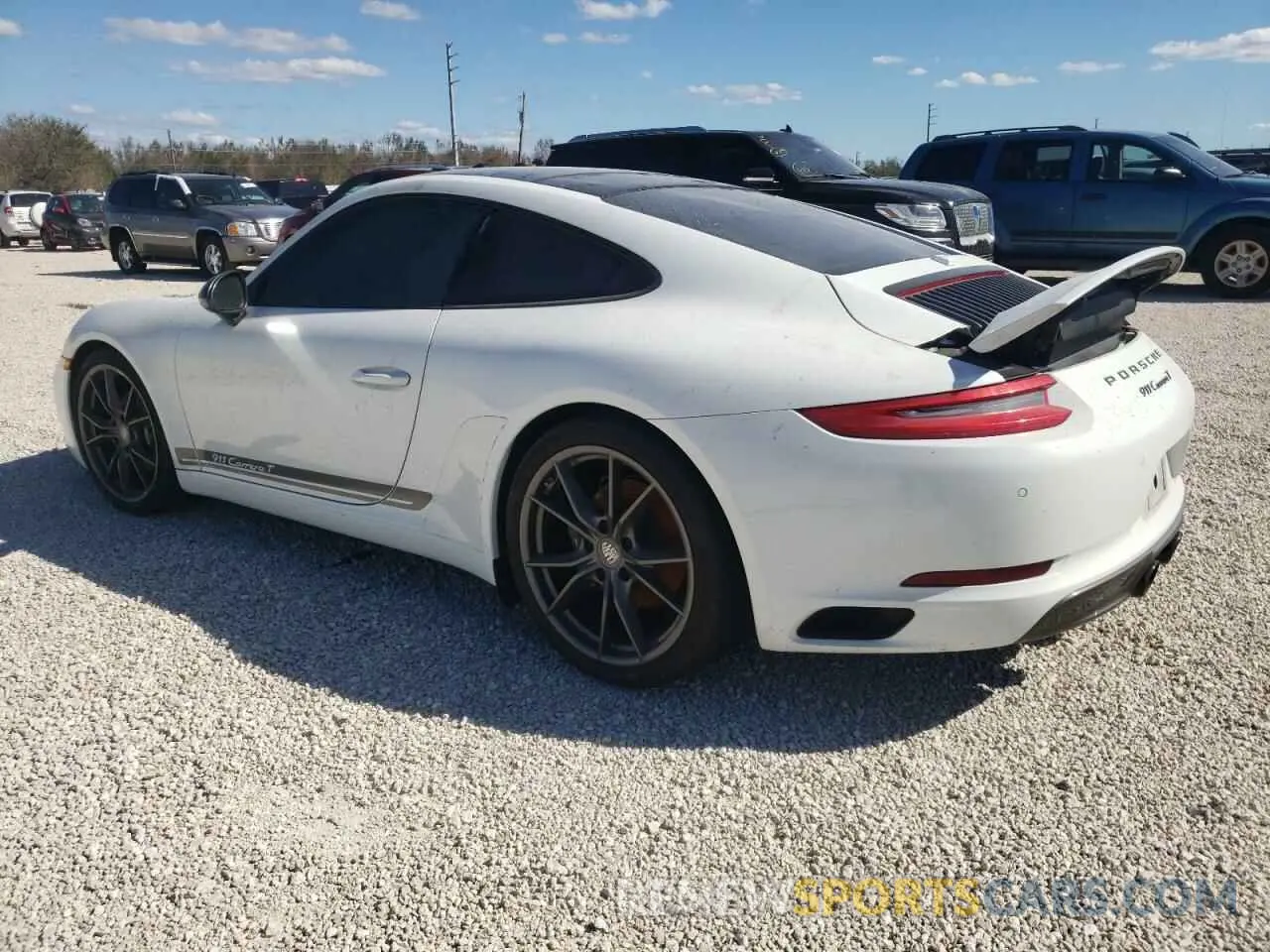 3 Photograph of a damaged car WP0AA2A95KS103920 PORSCHE 911 2019