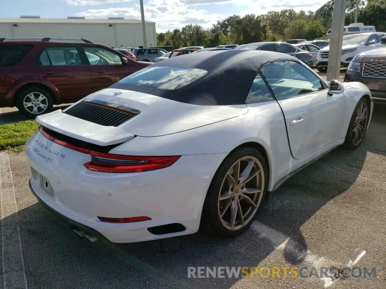 4 Photograph of a damaged car WP0CB2A90KS136541 PORSCHE 911 2019