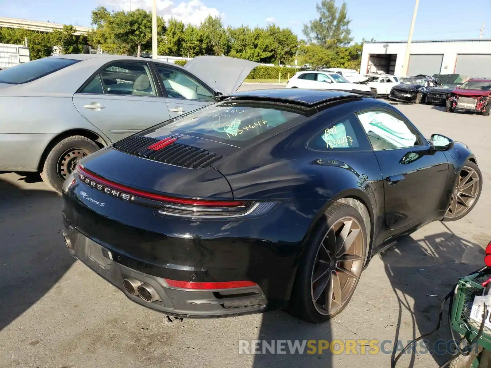 4 Photograph of a damaged car WP0AB2A95LS227491 PORSCHE 911 2020