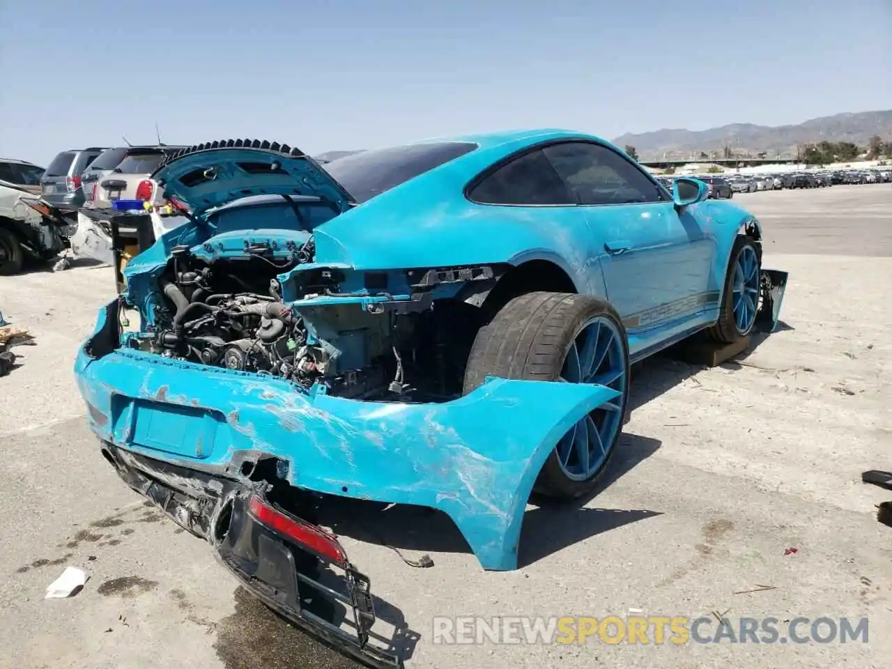 4 Photograph of a damaged car WP0AA2A96MS205214 PORSCHE 911 2021