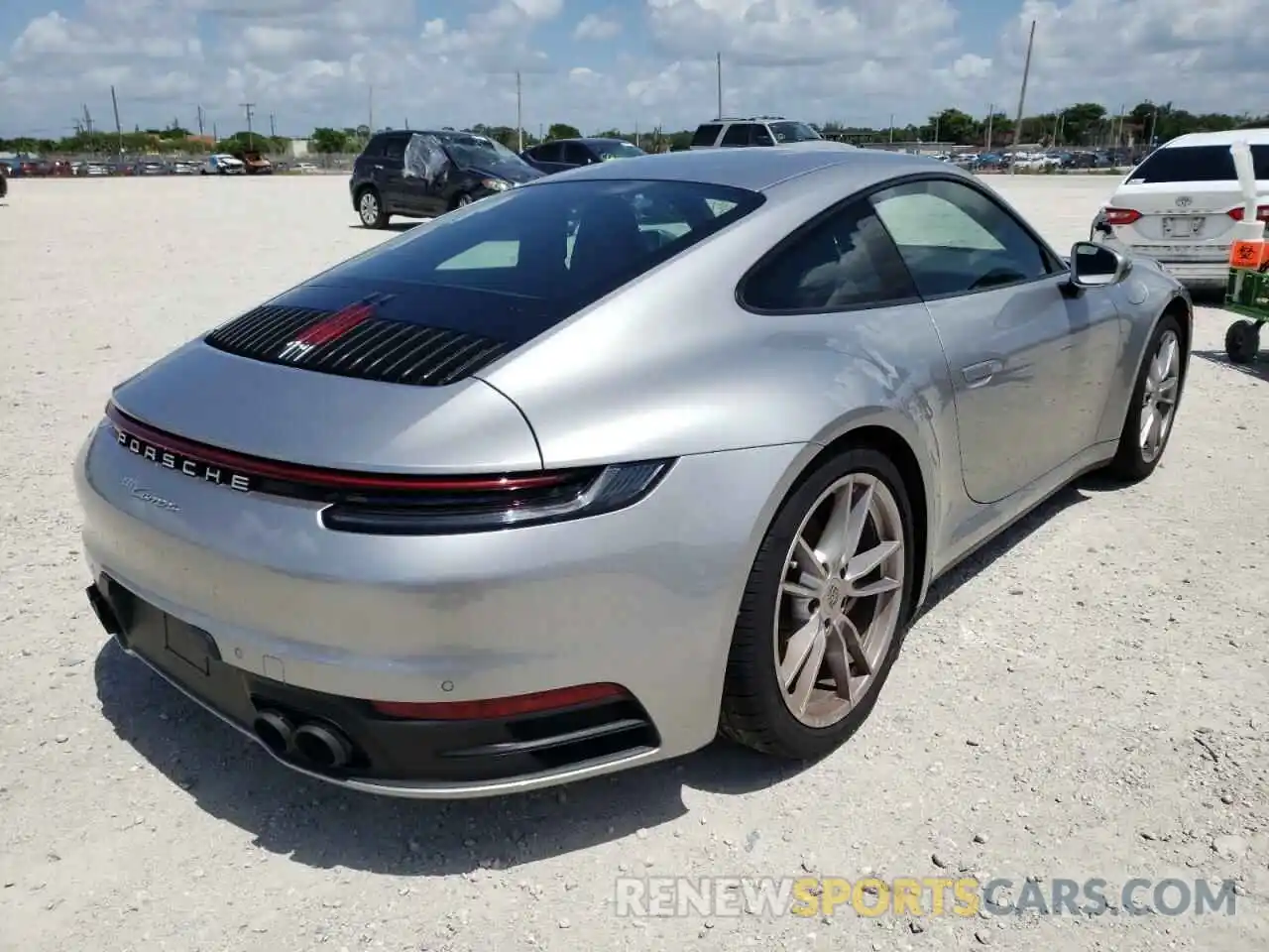 4 Photograph of a damaged car WP0AA2A90NS205095 PORSCHE 911 2022