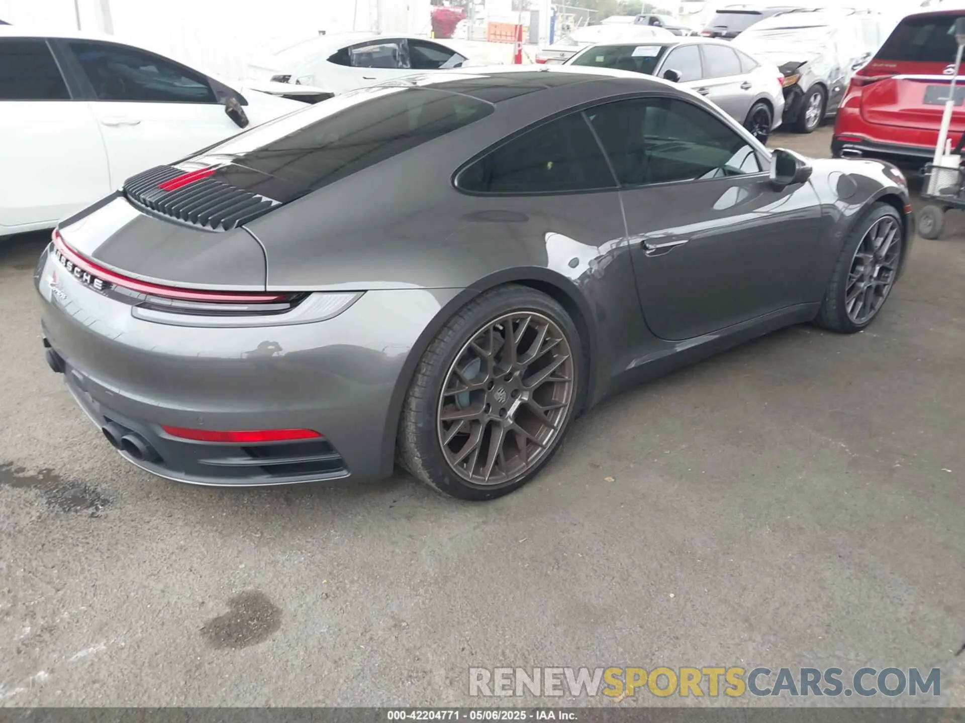 4 Photograph of a damaged car WP0AA2A94NS205939 PORSCHE 911 2022