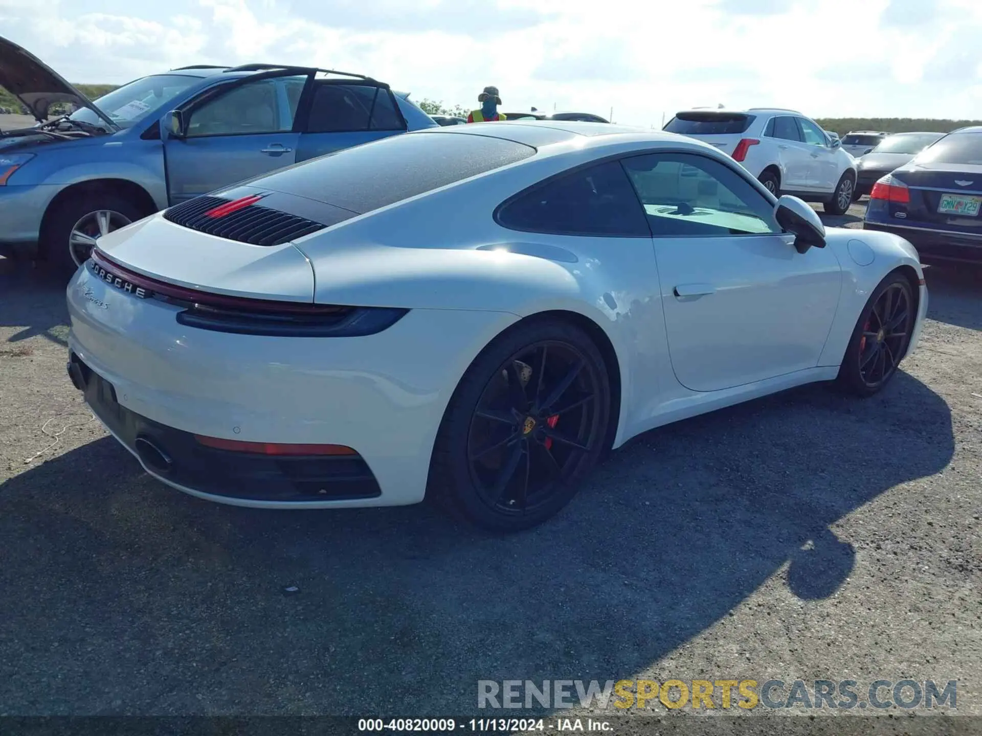 4 Photograph of a damaged car WP0AB2A9XNS220717 PORSCHE 911 2022