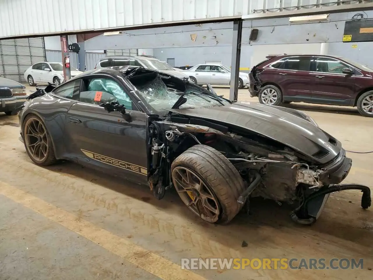 4 Photograph of a damaged car WP0AC2A99NS268836 PORSCHE 911 2022