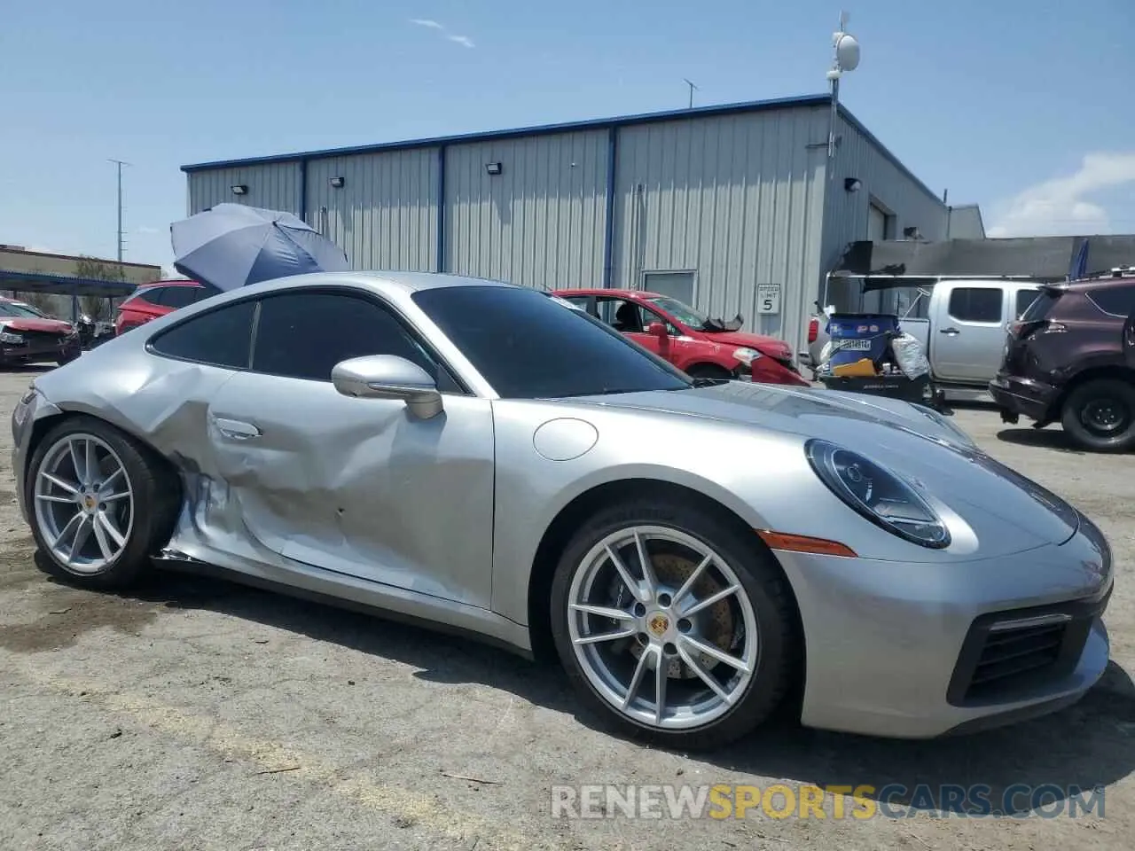 4 Photograph of a damaged car WP0AA2A90RS210058 PORSCHE 911 2024