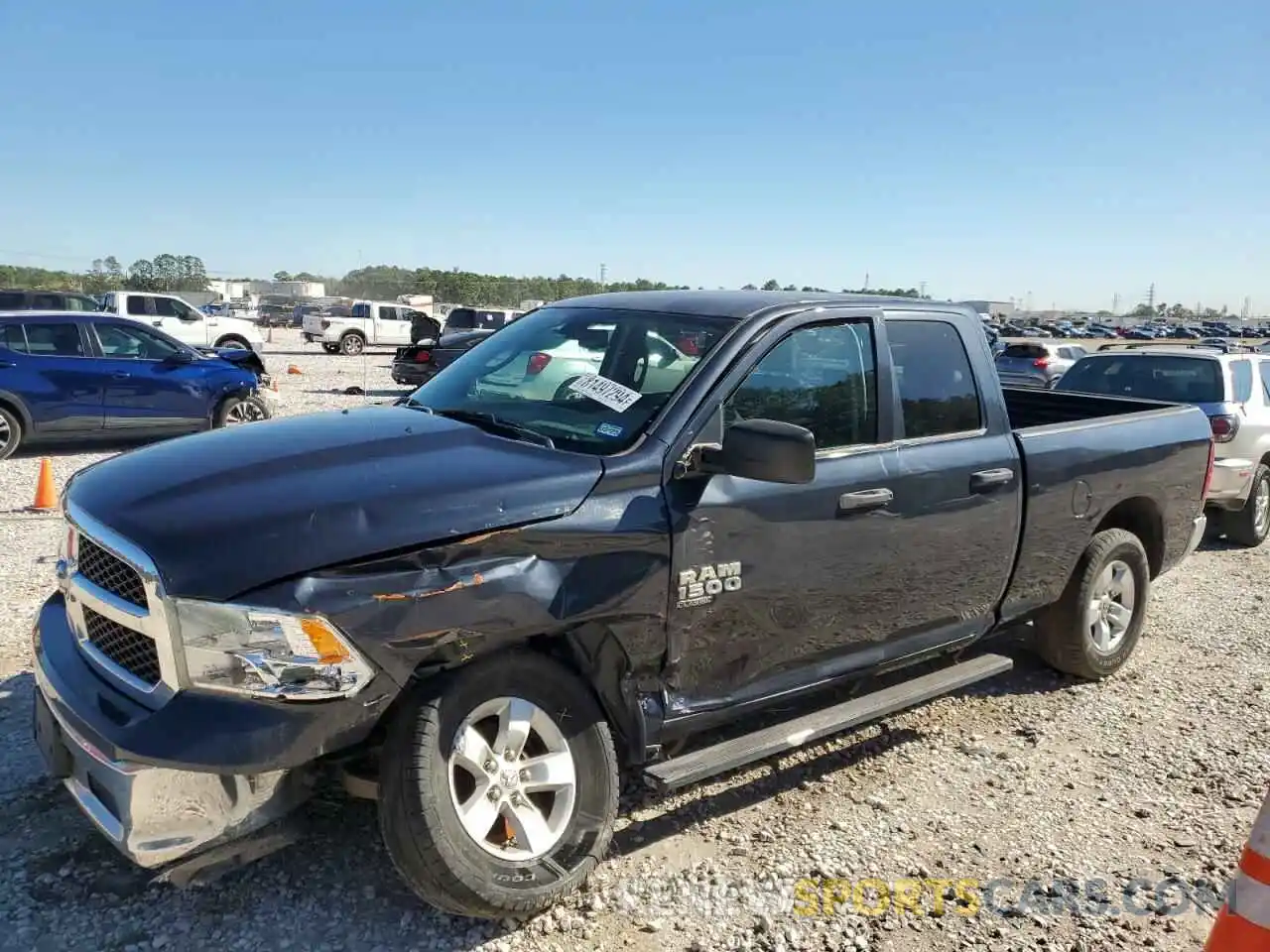 1 Photograph of a damaged car 1C6RR6FG7KS630553 RAM 1500 2019