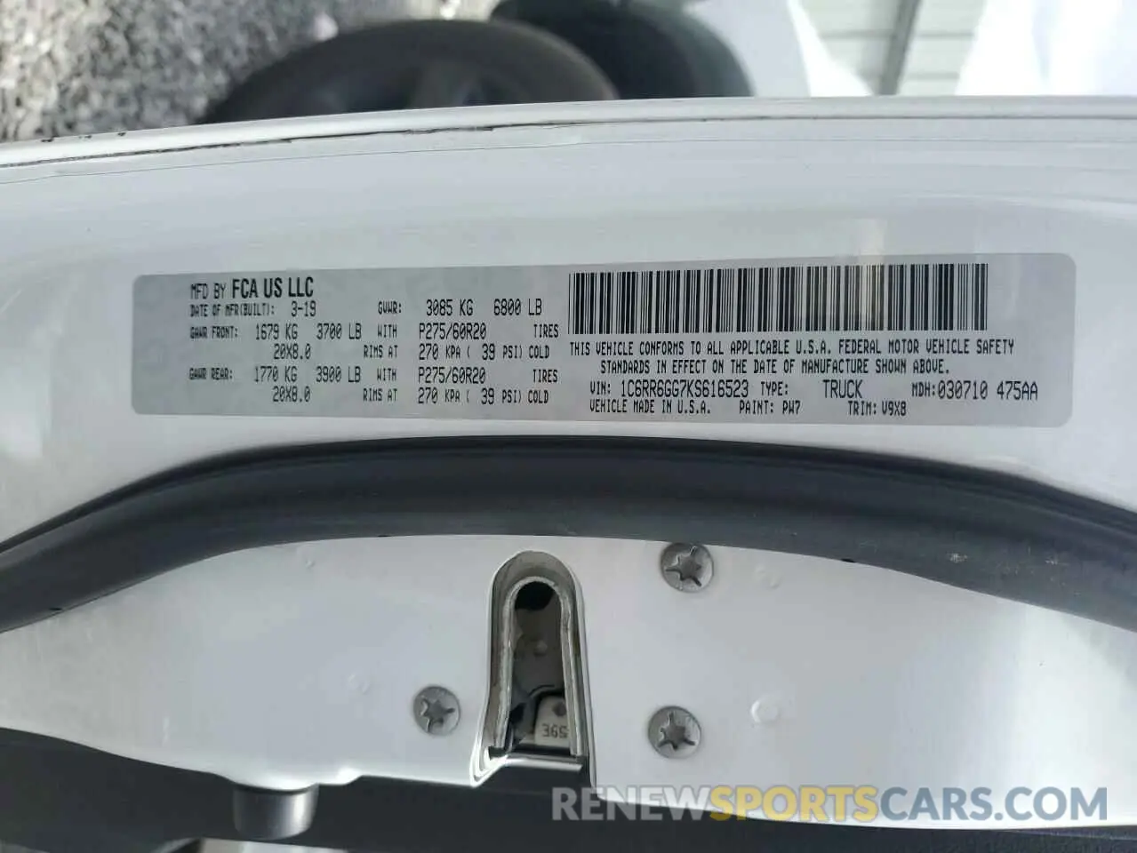 12 Photograph of a damaged car 1C6RR6GG7KS616523 RAM 1500 2019