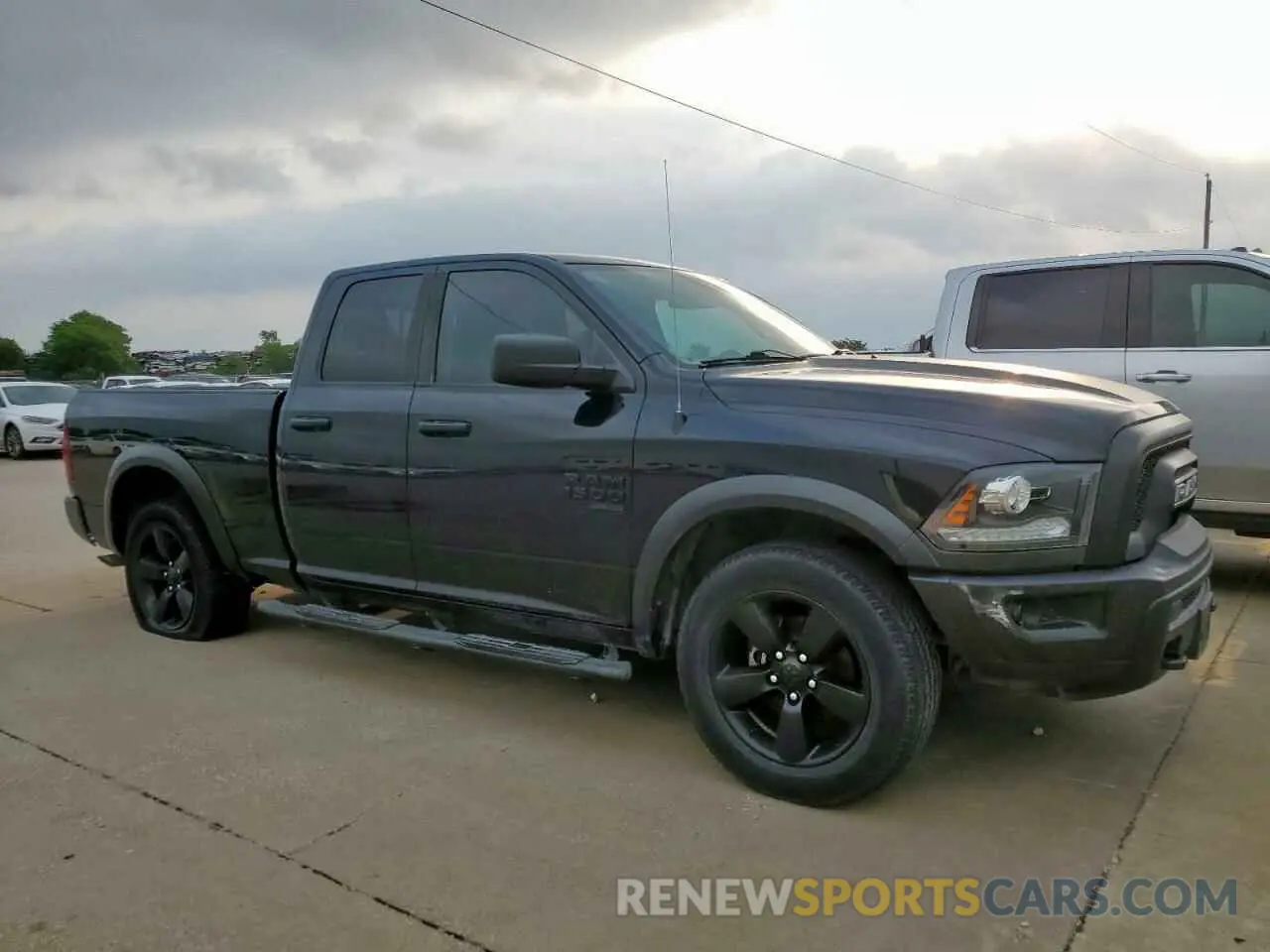 4 Photograph of a damaged car 1C6RR6GG9KS618659 RAM 1500 2019