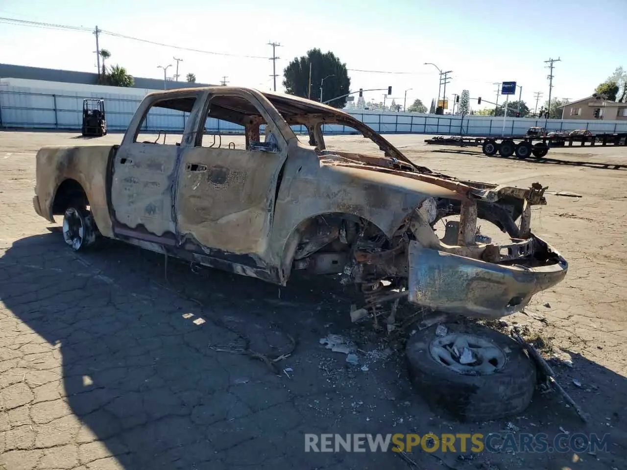 4 Photograph of a damaged car 1C6RR6KMXKS750617 RAM 1500 2019