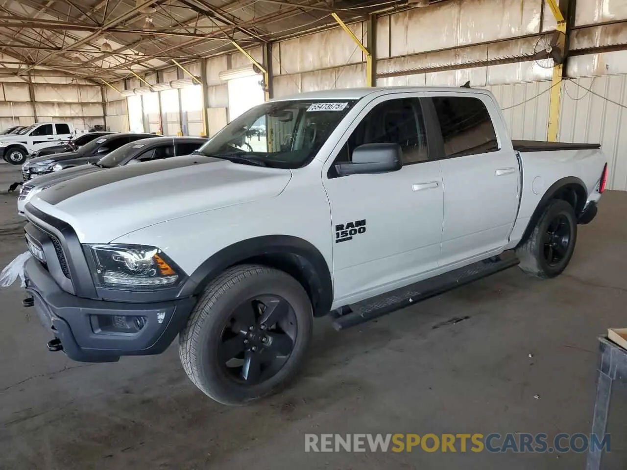 1 Photograph of a damaged car 1C6RR6LG5KS633424 RAM 1500 2019