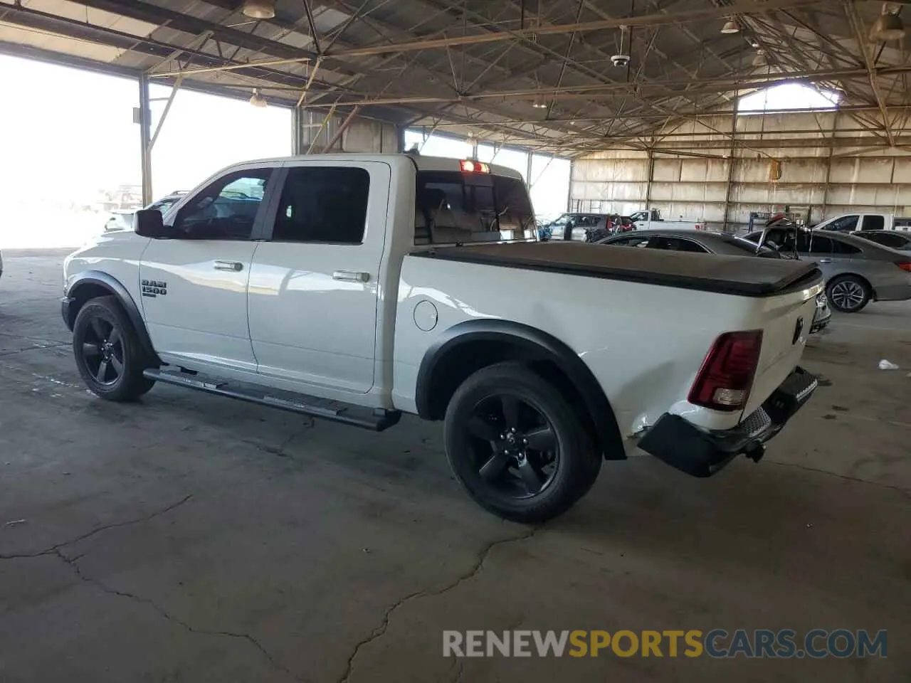 2 Photograph of a damaged car 1C6RR6LG5KS633424 RAM 1500 2019