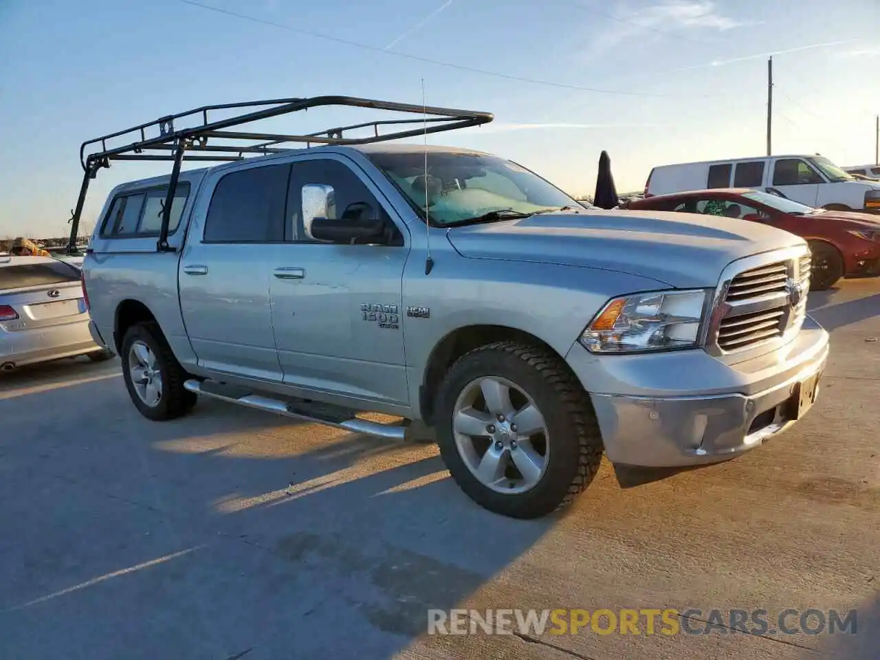 4 Photograph of a damaged car 1C6RR6LT5KS528833 RAM 1500 2019